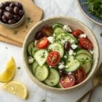 Mediterranean Cucumber Salad – The Ultimate Fresh & Flavorful Summer Side 8 Mediterranean cucumber salad in bowl with feta and olives