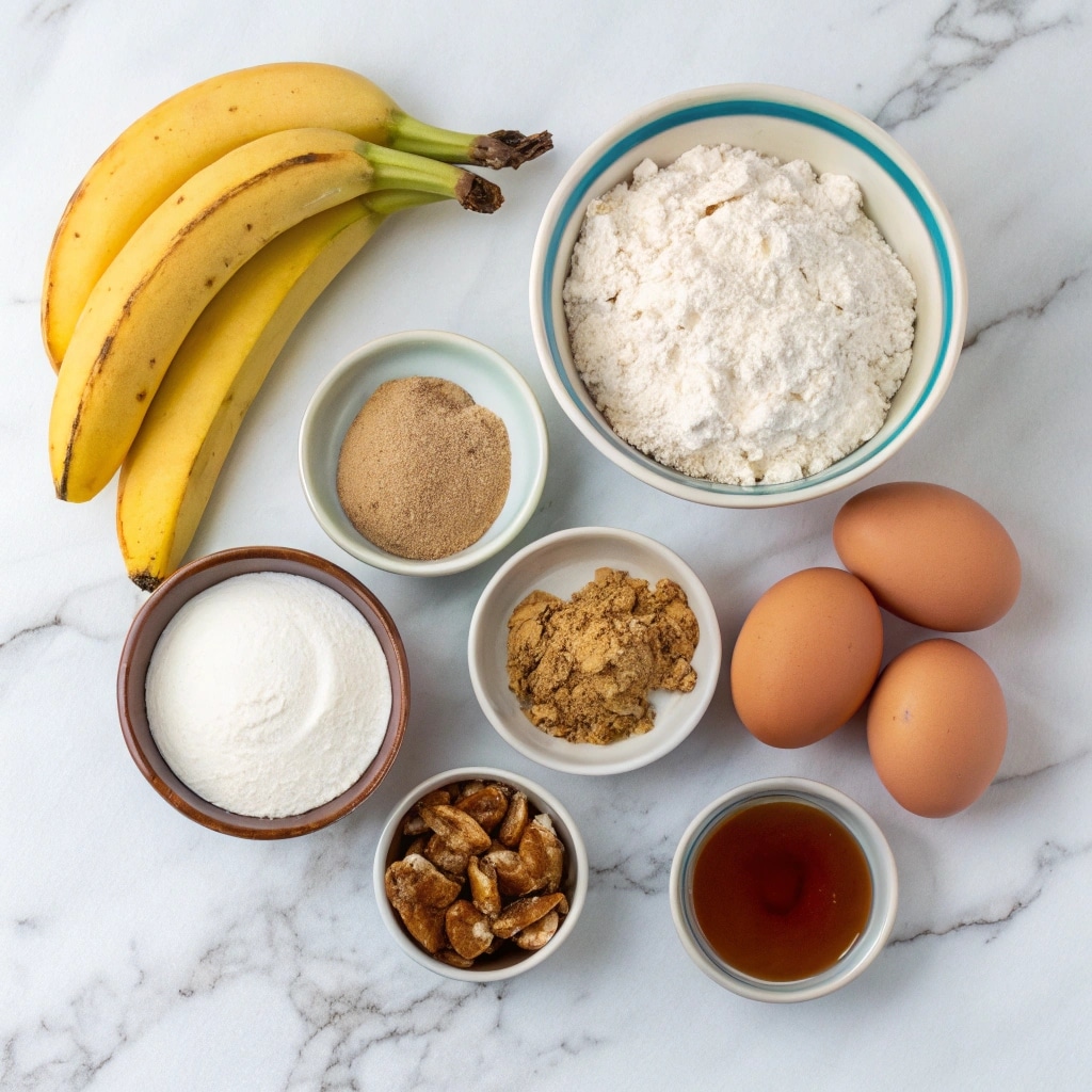 Air Fryer Banana Bread Healthy Recipe You’ll Make on Repeat 6 Healthy air fryer banana bread ingredients flat lay