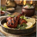 Tandoori Chicken Recipe: Juicy, Flavor-Packed, and Easy to Make at Home 5 Tandoori chicken recipe served with lemon and herbs